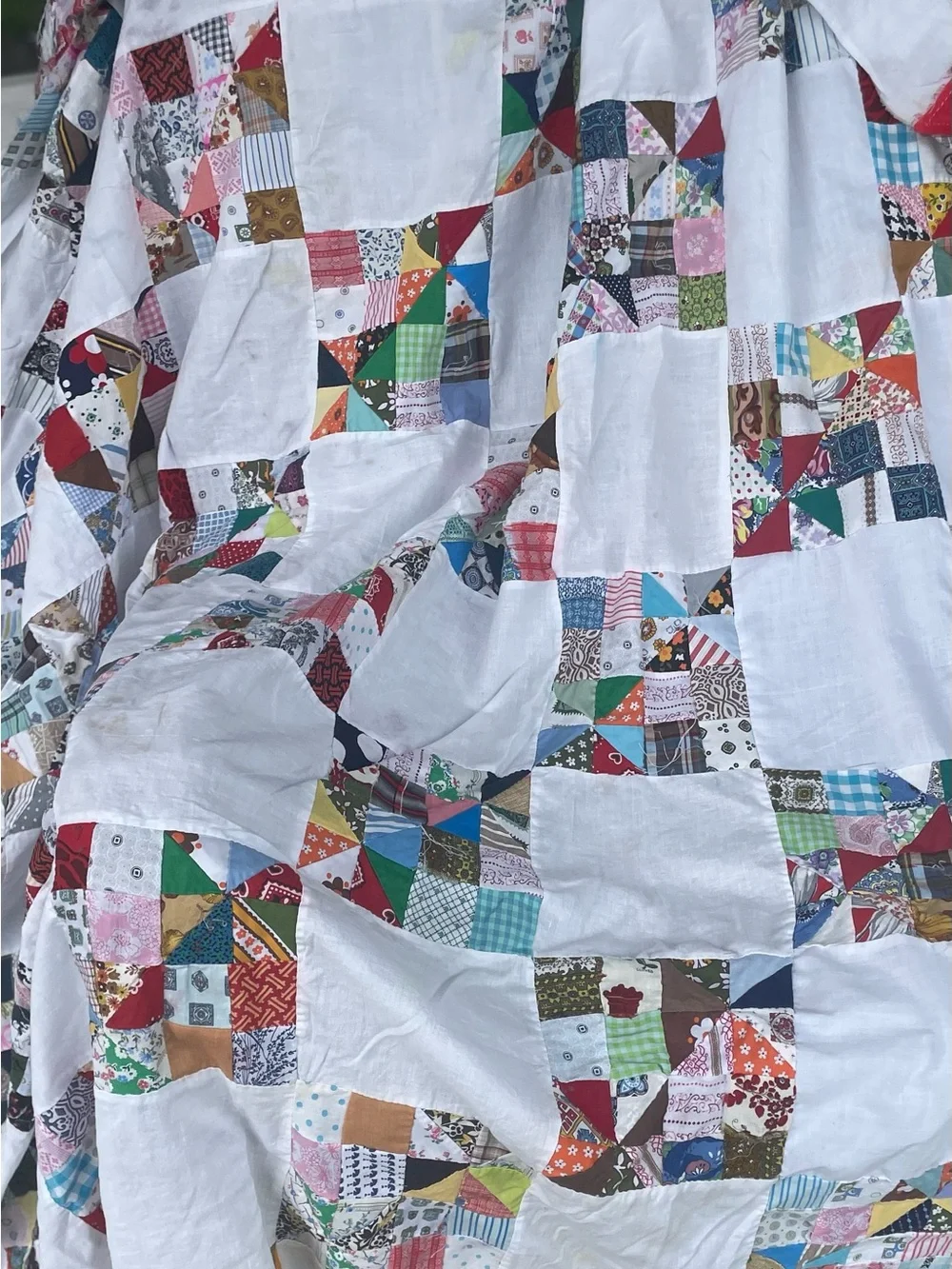 Handmade Hand stitched  White Patchwork Quilt with Multicolored Squares.